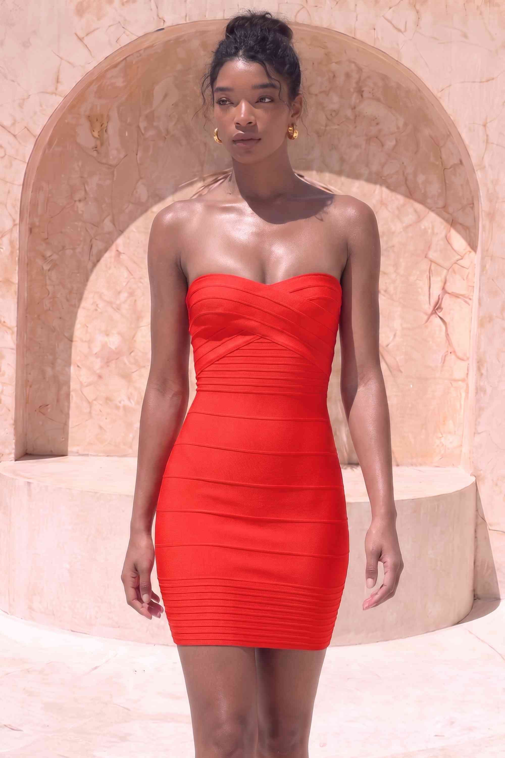 Woman wearing a figure flattering Aaliyah Bandage Mini Dress - Lipstick Red BODYCON COLLECTION