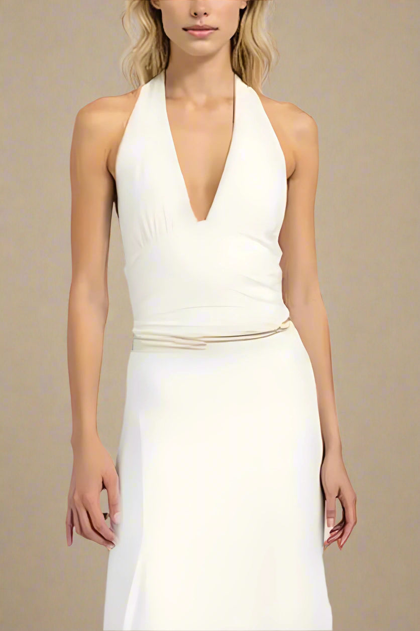 Woman wearing a figure flattering Aby Bodycon Top - White Pearl BODYCON COLLECTION Pty Ltd