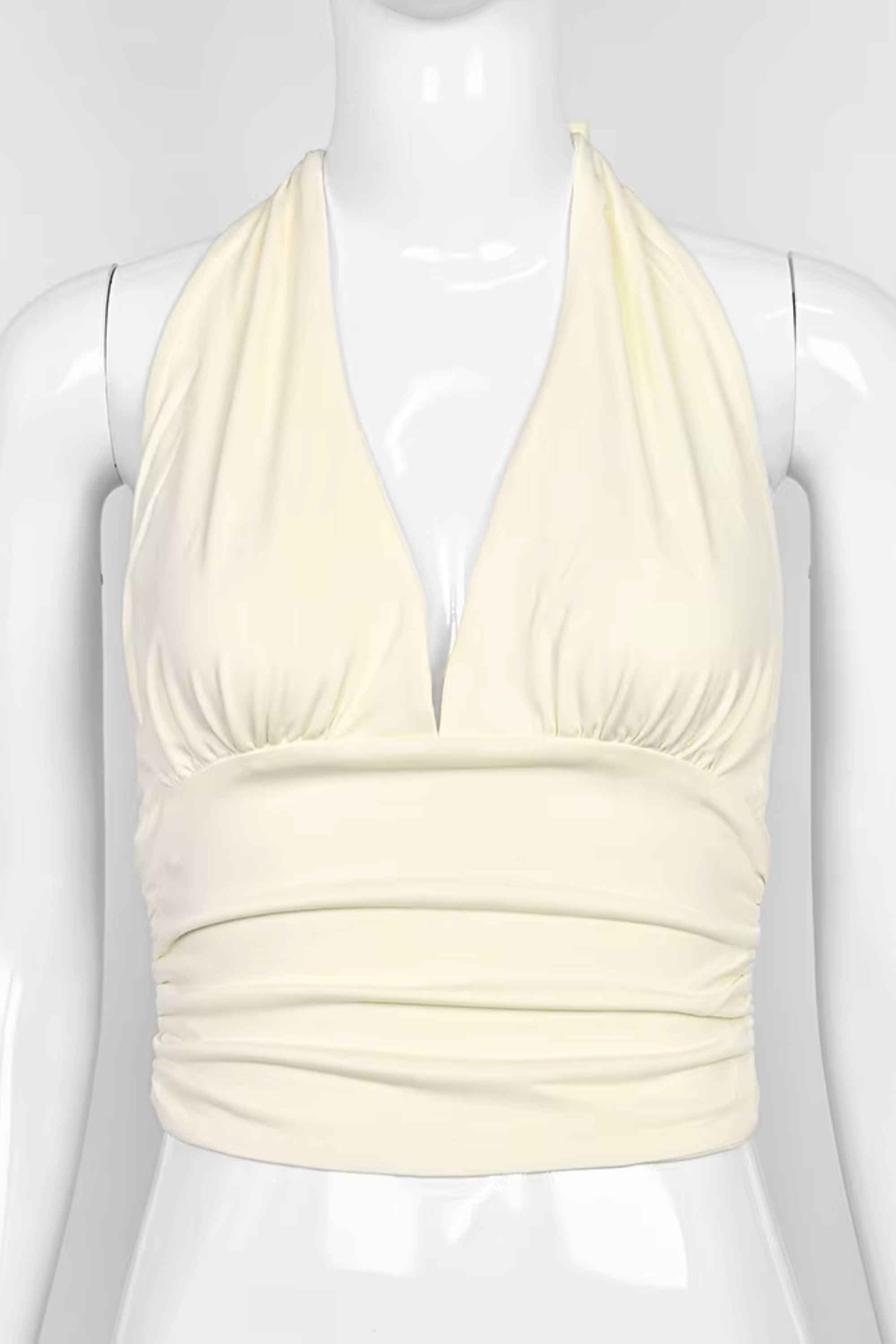 Woman wearing a figure flattering Aby Halter Top - Butter Yellow BODYCON COLLECTION Pty Ltd