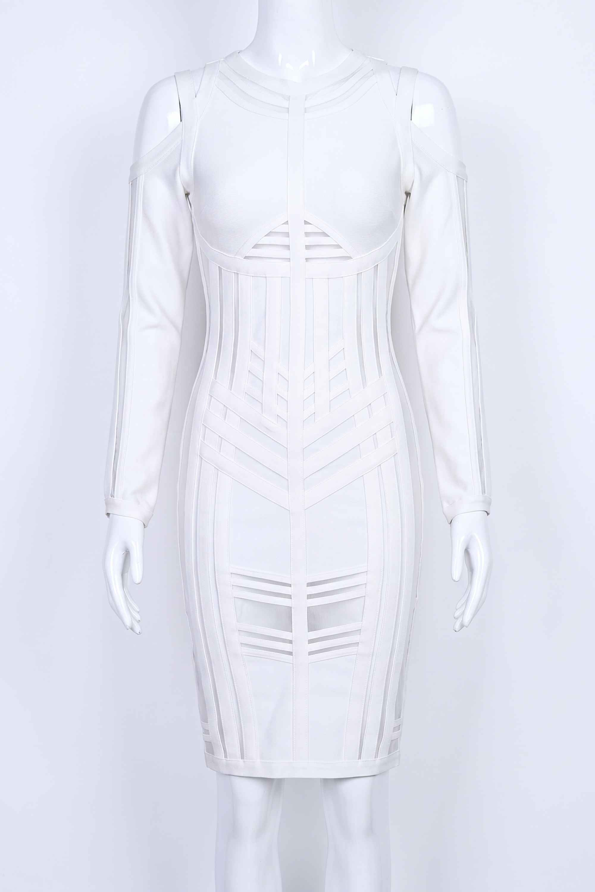 Woman wearing a figure flattering Amelia Long Sleeve Bandage Dress - Pearl White BODYCON COLLECTION
