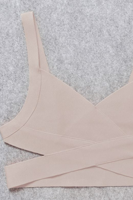 Woman wearing a figure flattering Ang Bandage Crop Top - Cream BODYCON COLLECTION