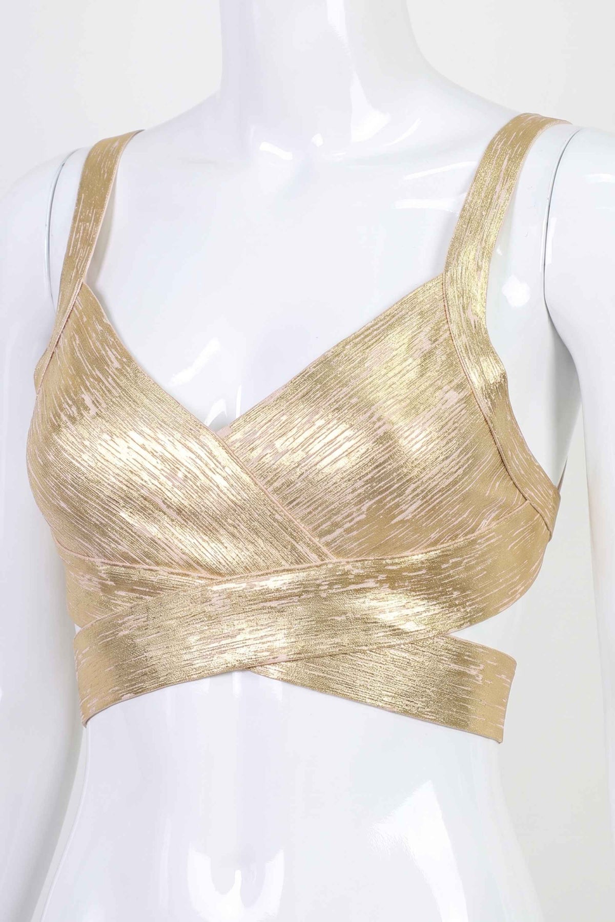 Woman wearing a figure flattering Ang Bandage Crop Top - Gold BODYCON COLLECTION