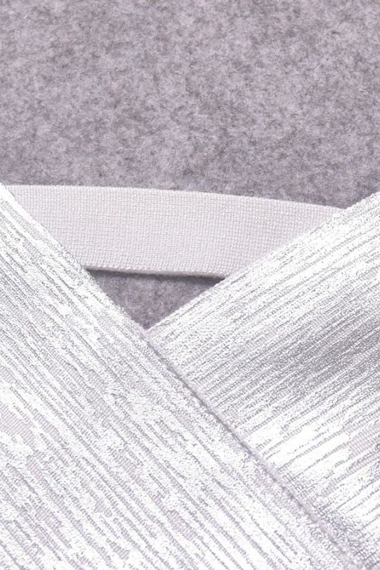 Woman wearing a figure flattering Ang Bandage Crop Top - Silver BODYCON COLLECTION