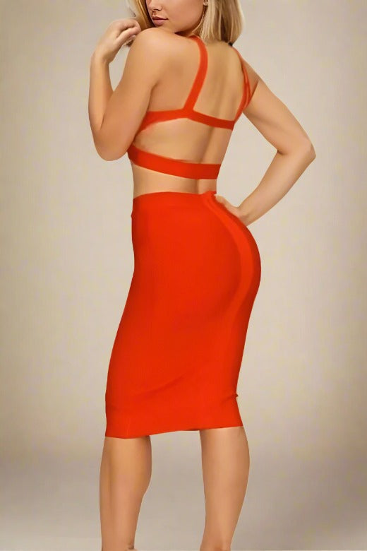 Woman wearing a figure flattering Ang Bandage Top and Knee Length Skirt Set - Lipstick Red BODYCON COLLECTION