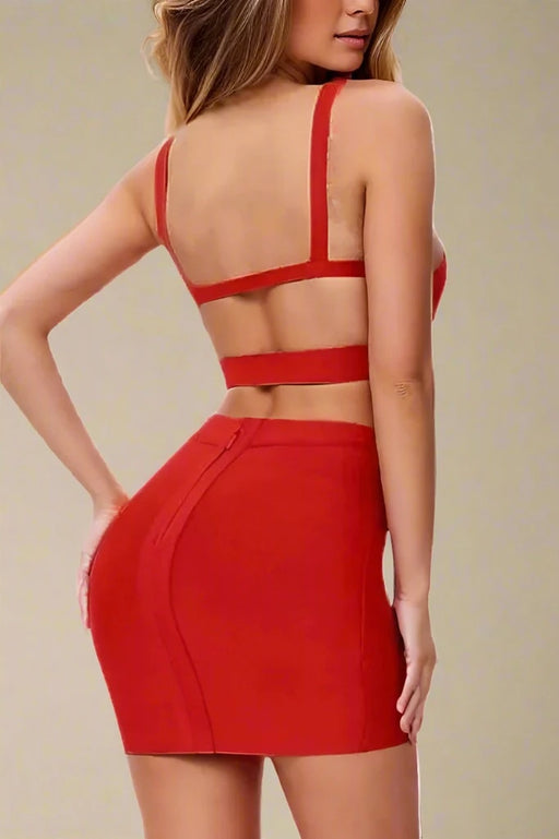 Woman wearing a figure flattering  Ang Bandage Top and Mini Skirt Set - Lipstick Red BODYCON COLLECTION