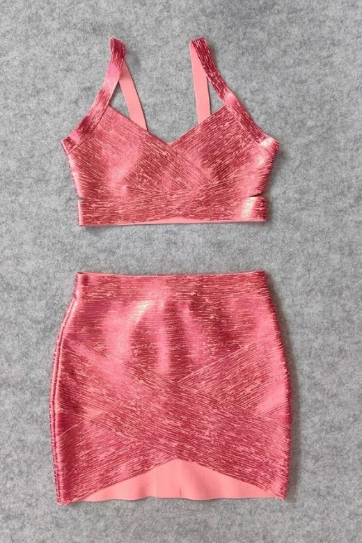 Woman wearing a figure flattering  Ang Bandage Top and Mini Skirt Set - Metallic Pink BODYCON COLLECTION