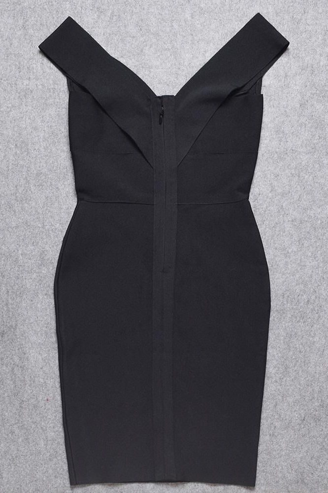 Woman wearing a figure flattering Ash Bandage Dress - Classic Black Bodycon Collection