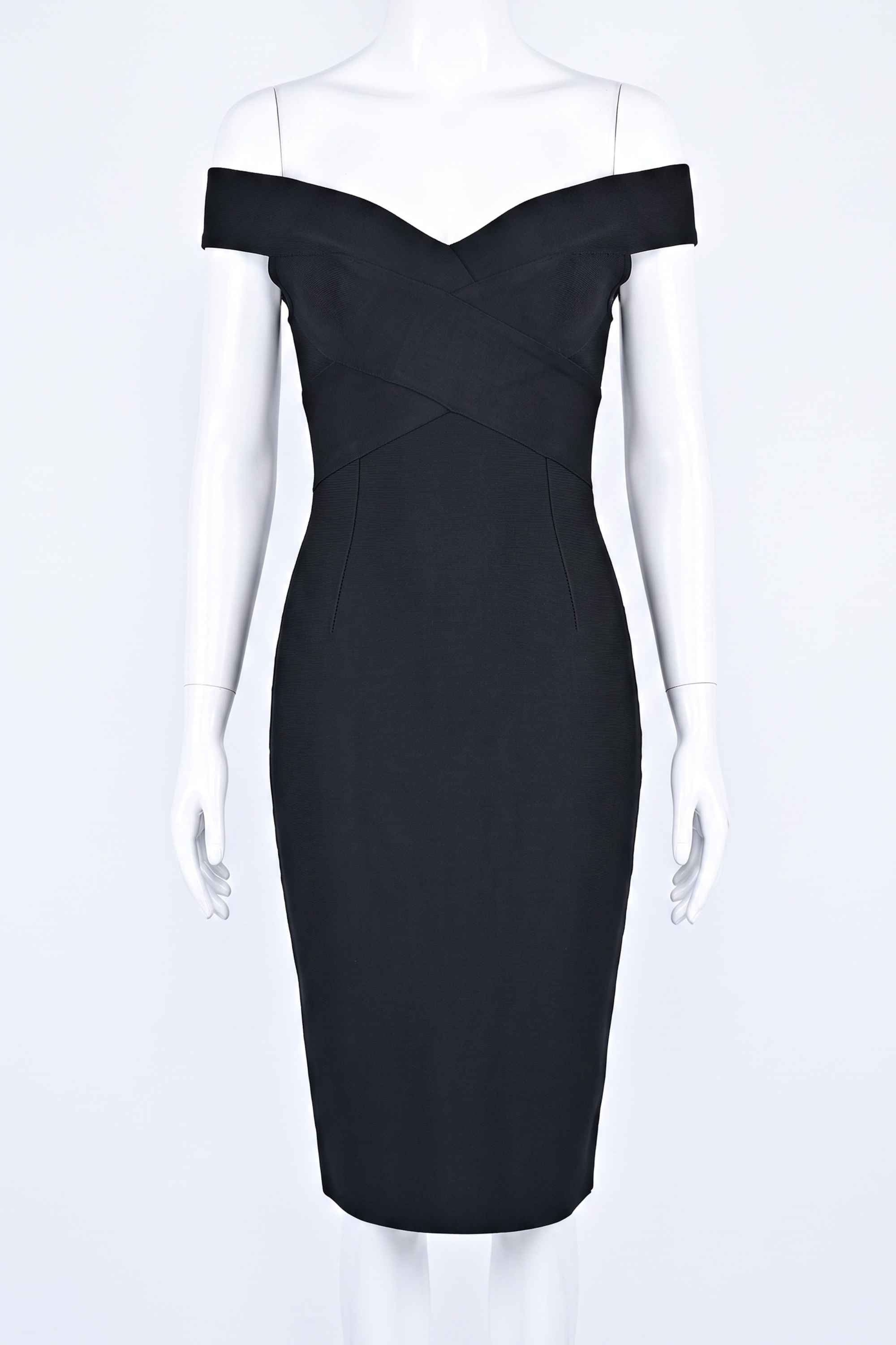 Woman wearing a figure flattering Ash Bandage Dress - Classic Black Bodycon Collection