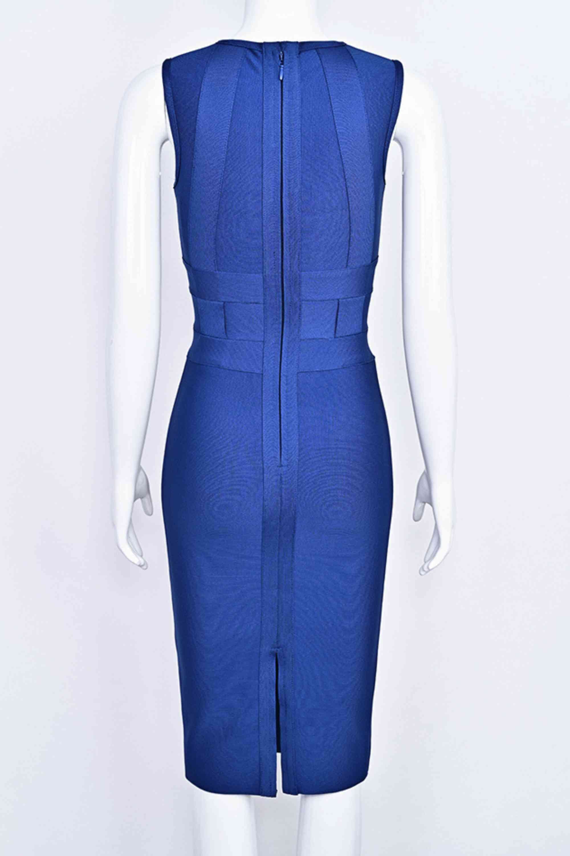 Woman wearing a figure flattering Aurora Bandage Dress - Navy Blue BODYCON COLLECTION Pty Ltd