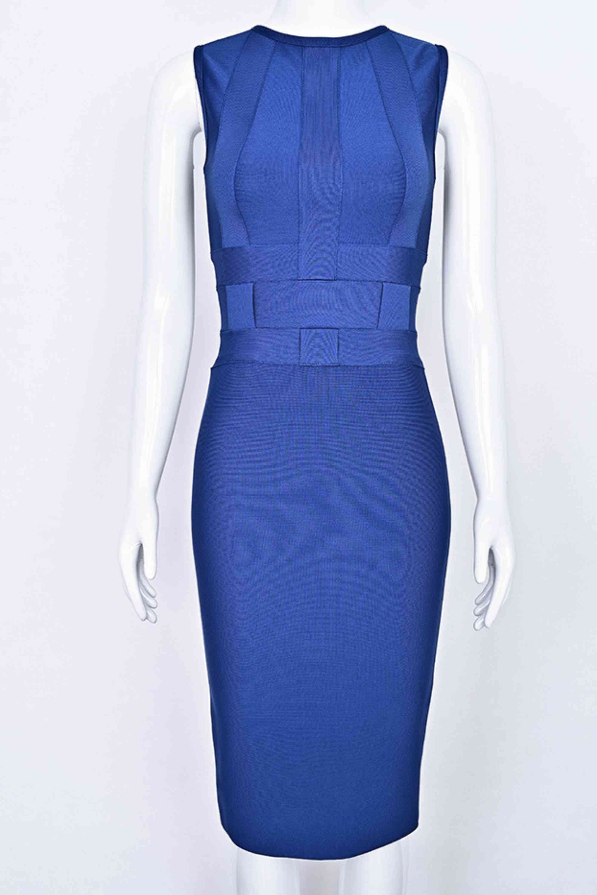 Woman wearing a figure flattering Aurora Bandage Dress - Navy Blue BODYCON COLLECTION Pty Ltd