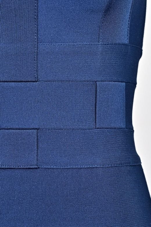 Woman wearing a figure flattering Aurora Bandage Dress - Navy Blue BODYCON COLLECTION Pty Ltd