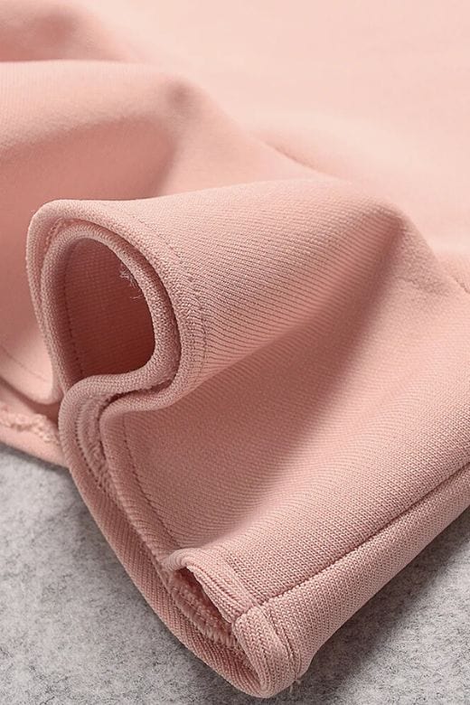 Woman wearing a figure flattering Avery Bandage Dress - Red Wine BODYCON COLLECTION