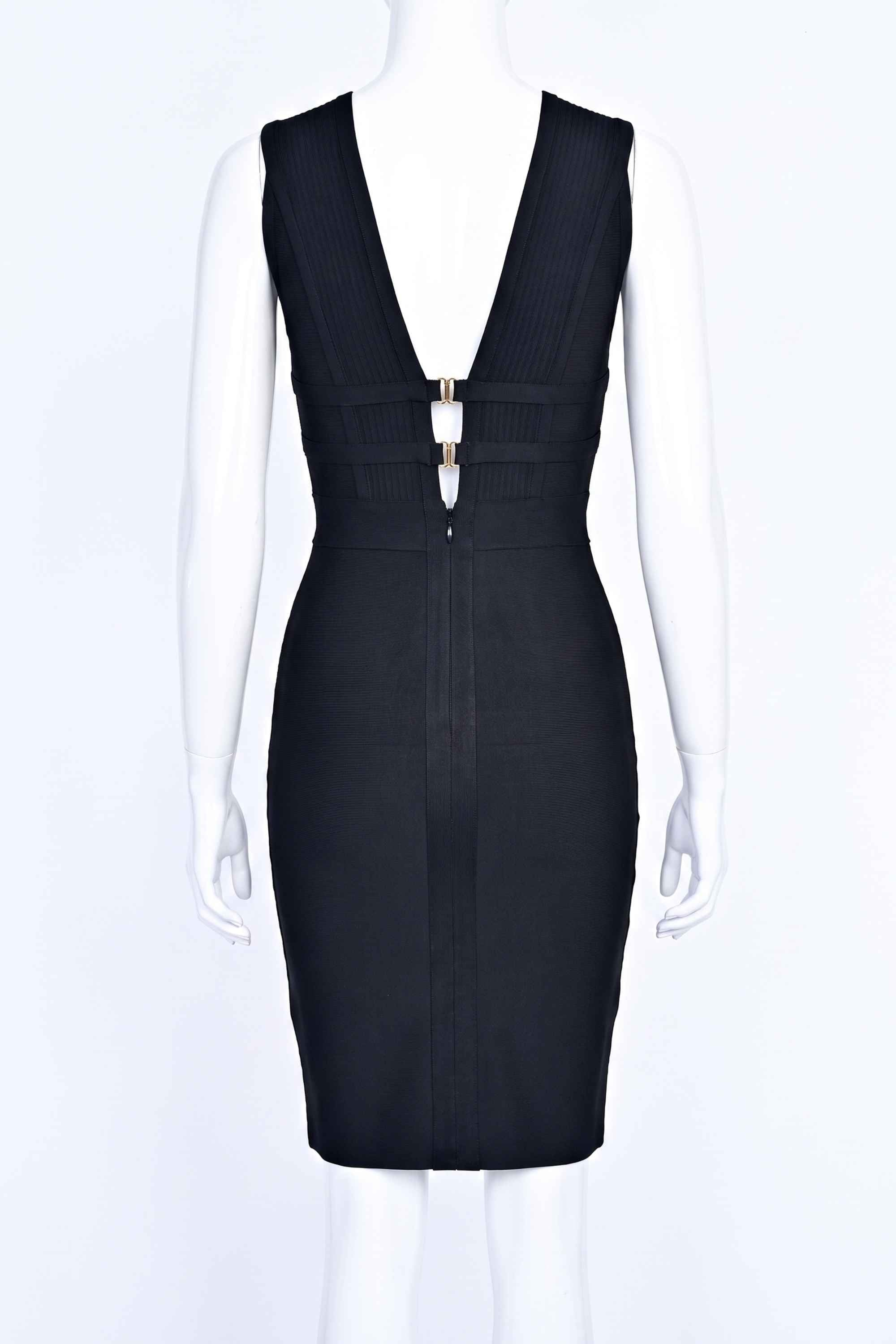 Woman wearing a figure flattering Bay Bandage Dress - Classic Black Bodycon Collection