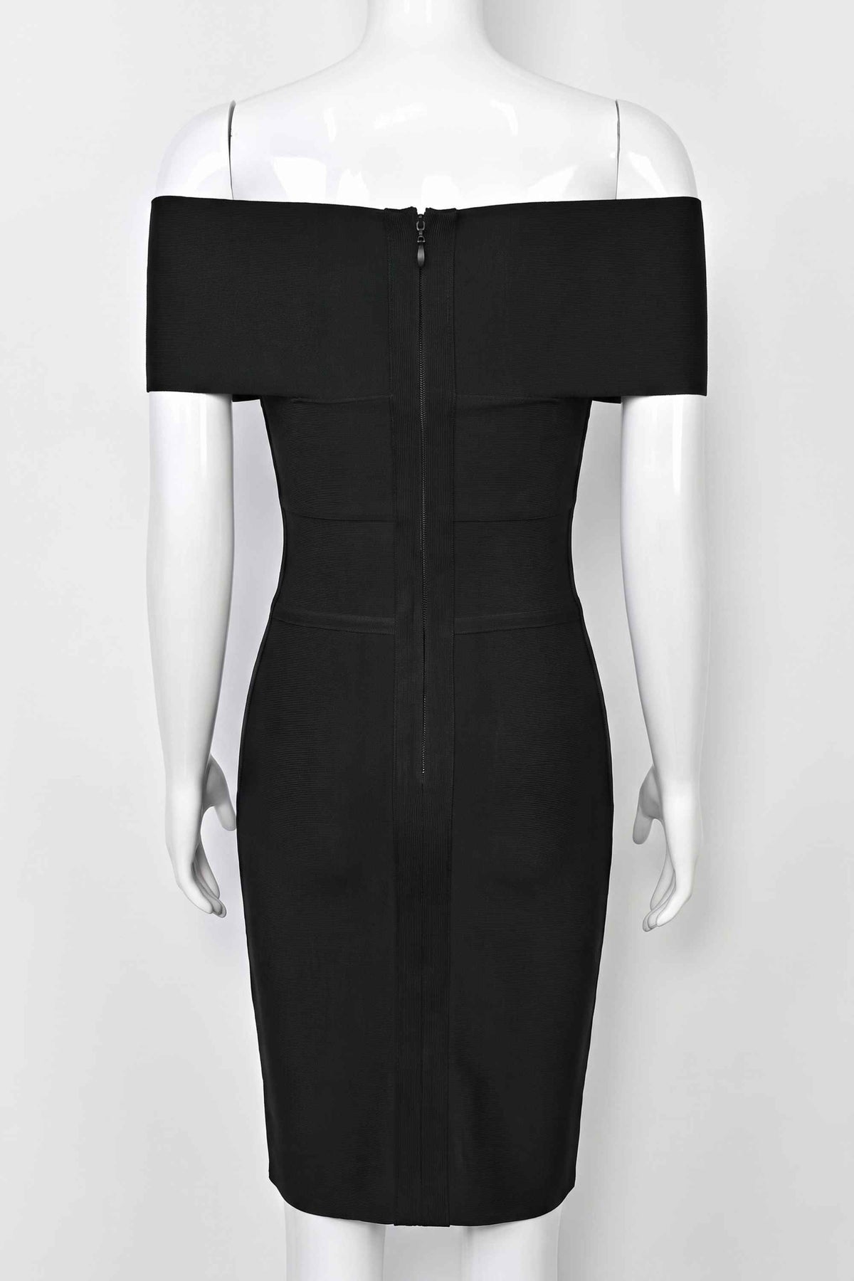 Woman wearing a figure flattering Bea Bandage Dress - Classic Black Bodycon Collection