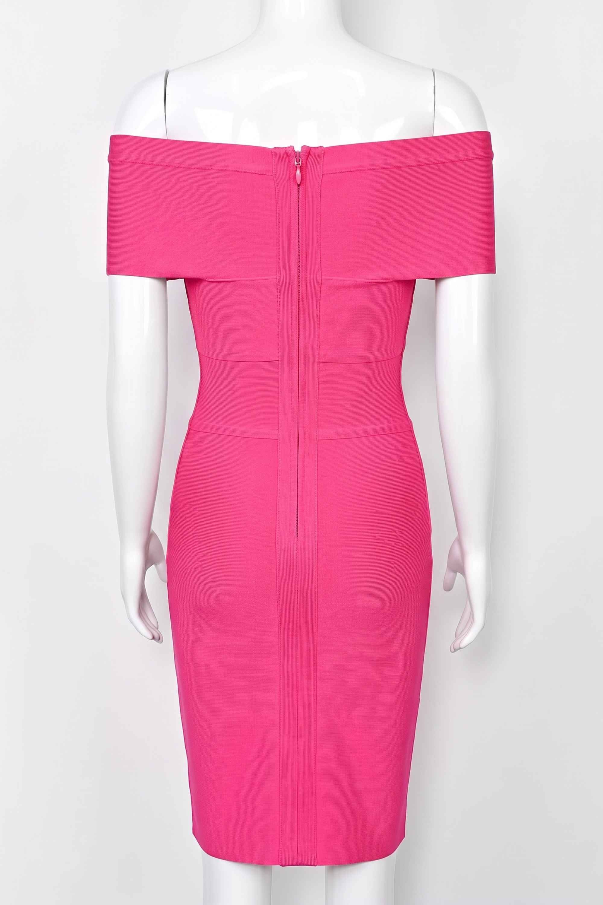 Woman wearing a figure flattering Bea Bandage Dress - Hot Pink Bodycon Collection