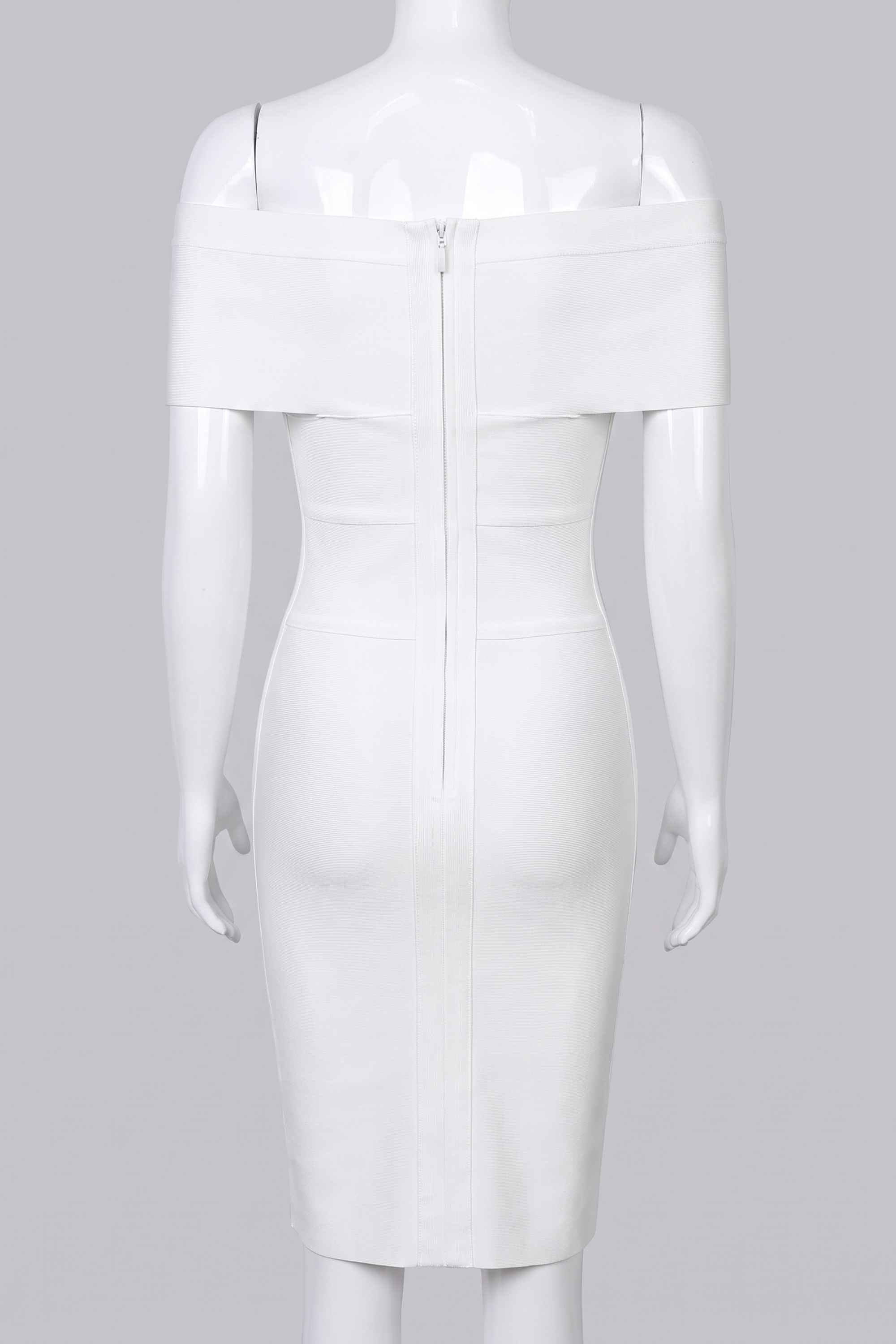 Woman wearing a figure flattering Bea Bandage Dress - Pearl White Bodycon Collection