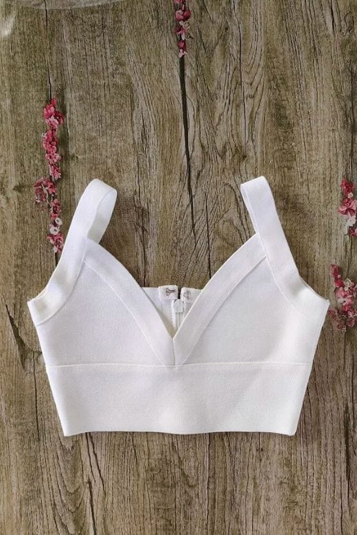 Woman wearing a figure flattering Bee Bandage Crop Top - Pearl White BODYCON COLLECTION