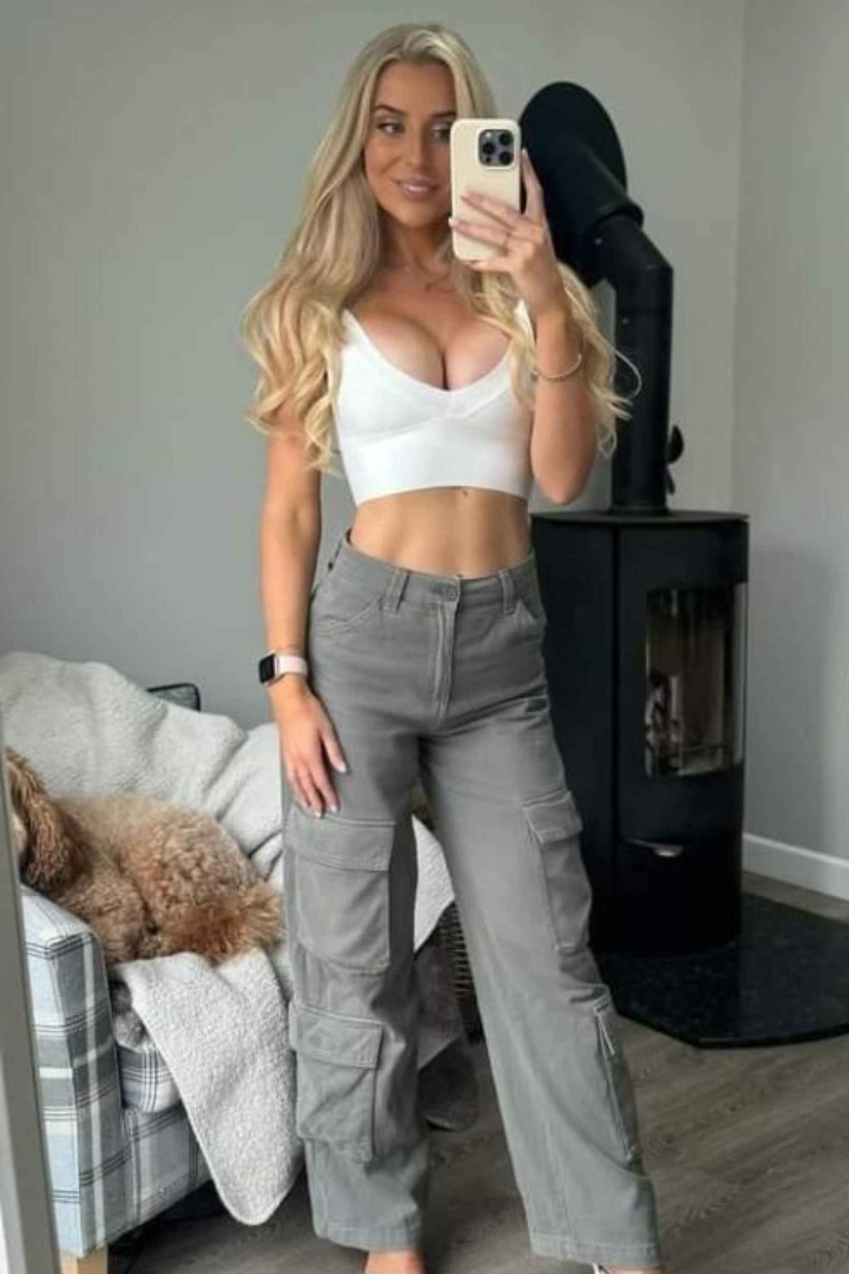Woman wearing a figure flattering Bee Bandage Crop Top - Pearl White BODYCON COLLECTION