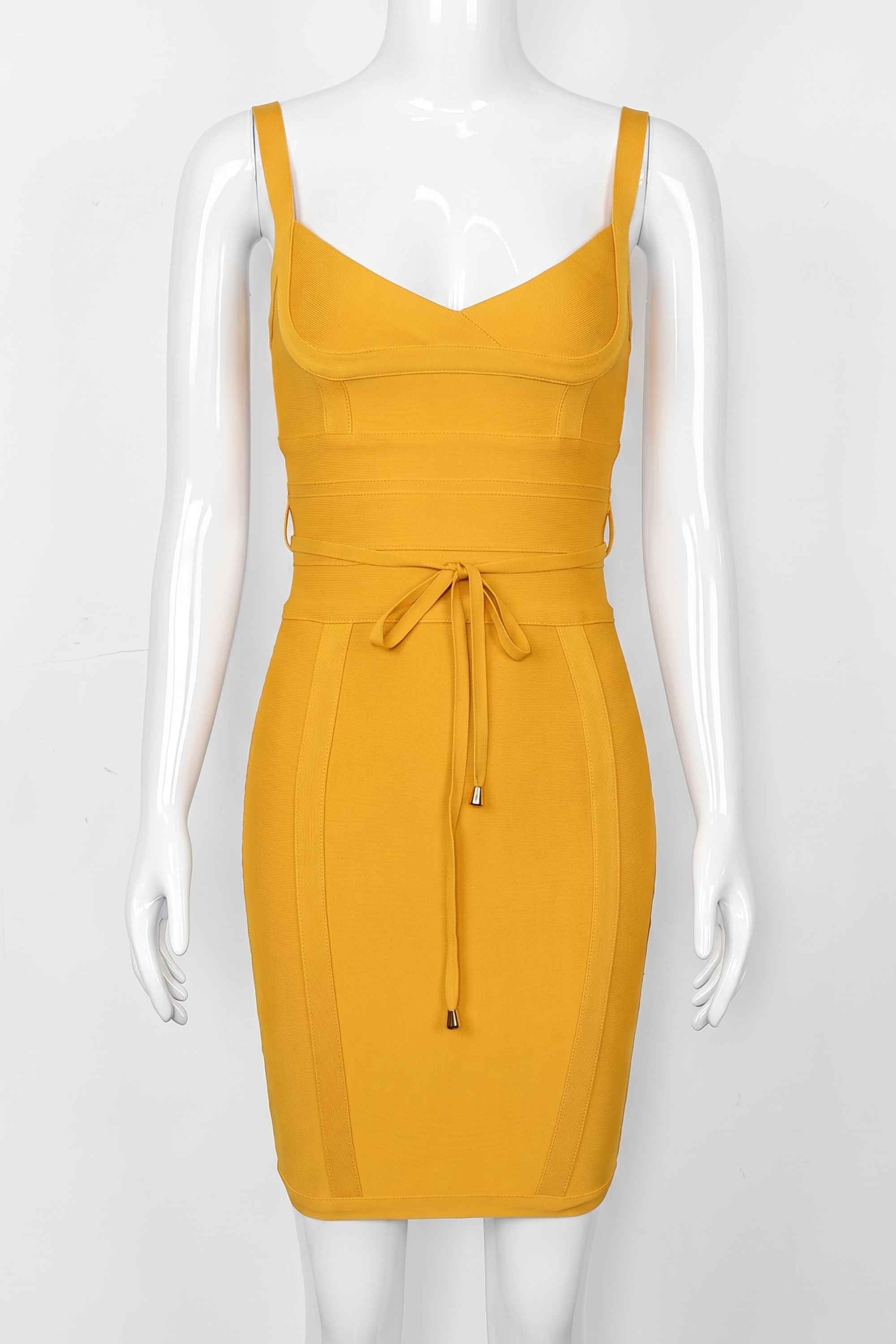Woman wearing a figure flattering Bek Bandage Dress - Mustard Yellow Bodycon Collection