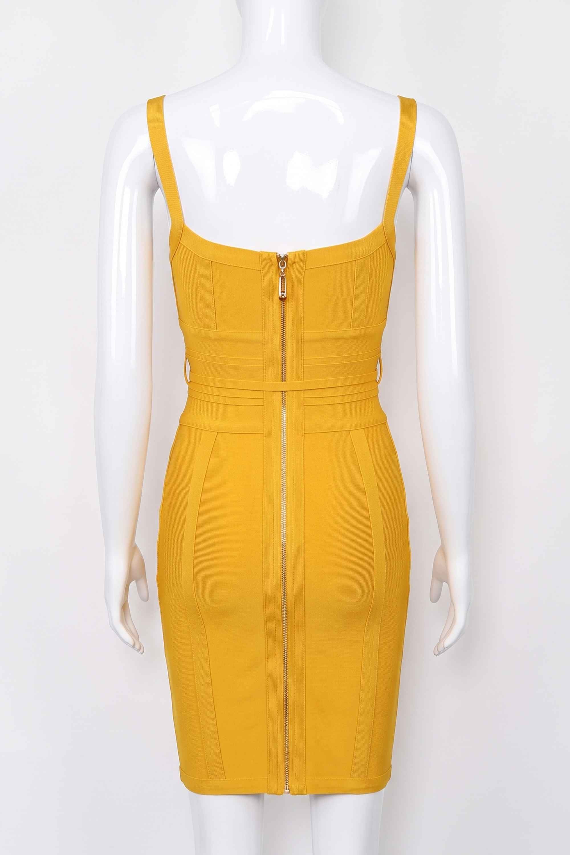 Woman wearing a figure flattering Bek Bandage Dress - Mustard Yellow Bodycon Collection