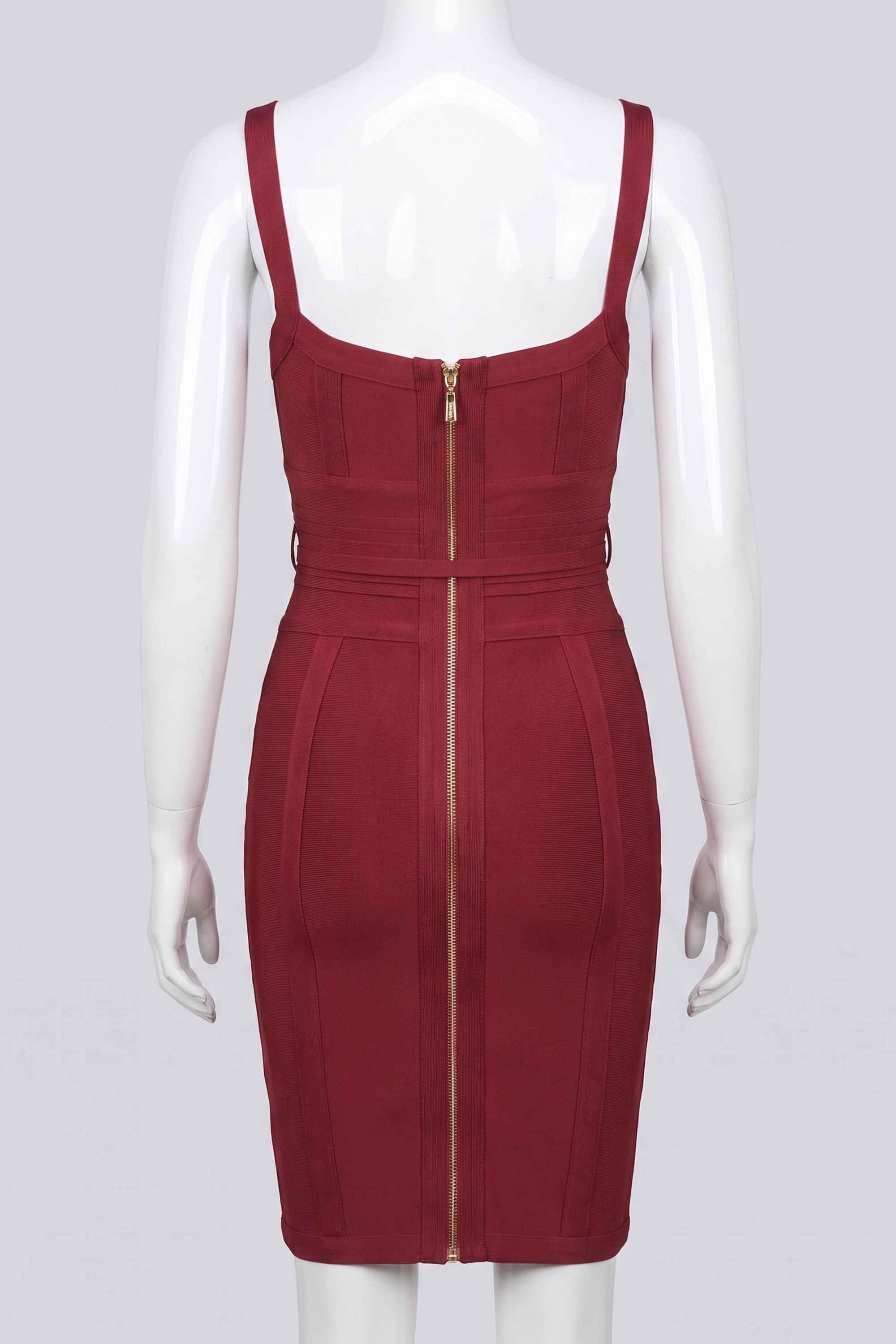 Woman wearing a figure flattering Bek Bandage Dress - Red Wine Bodycon Collection