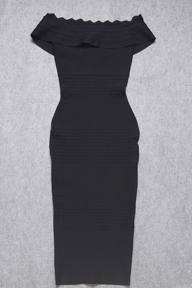 Woman wearing a figure flattering Billie Bandage Midi Dress - Classic Black Bodycon Collection