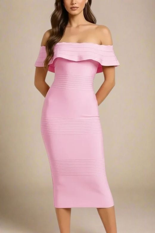 Woman wearing a figure flattering Billie Bandage Midi Dress - Dusty Pink Bodycon Collection