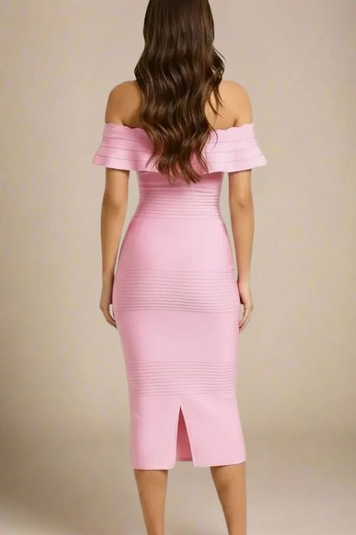 Woman wearing a figure flattering Billie Bandage Midi Dress - Dusty Pink Bodycon Collection