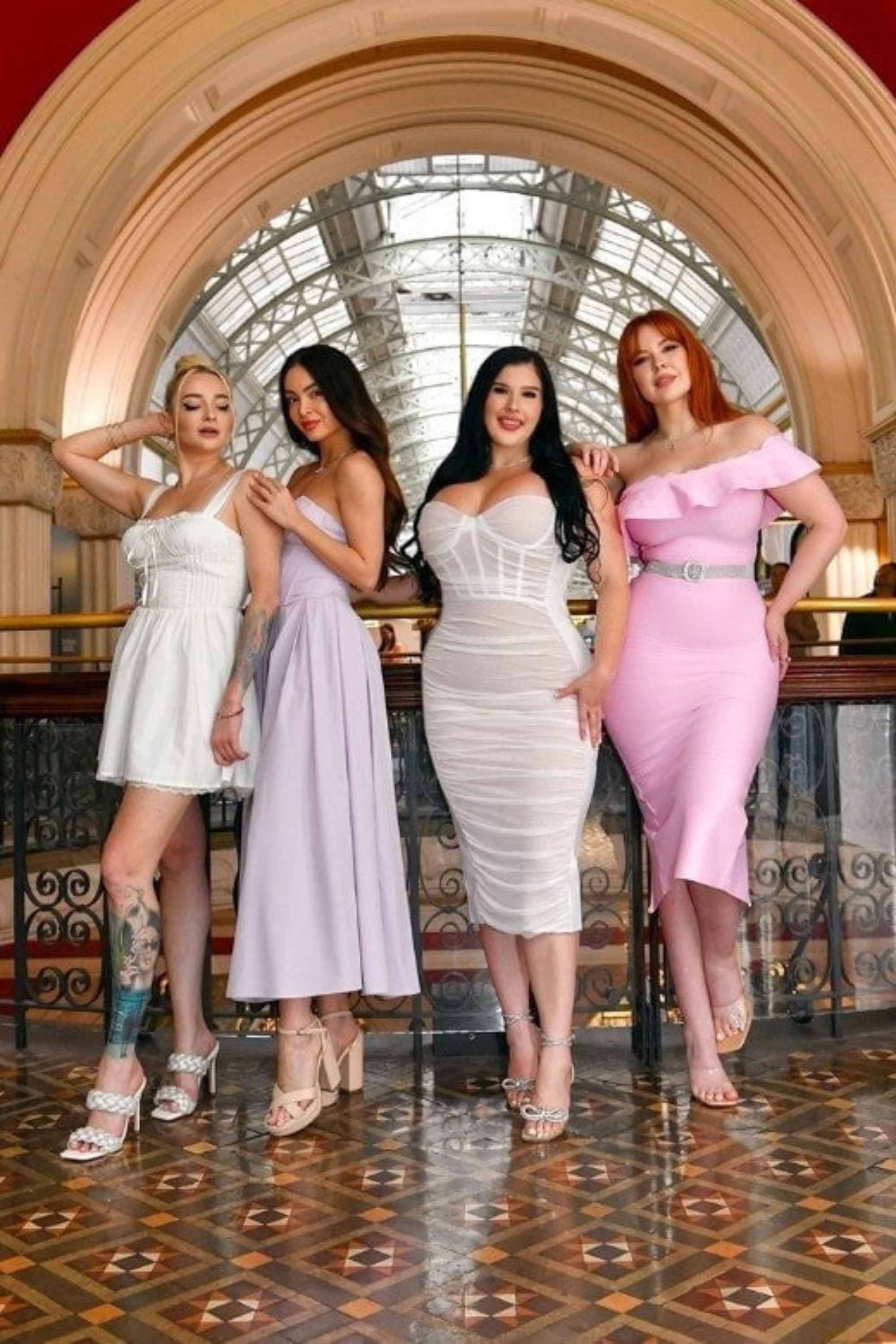 Woman wearing a figure flattering Billie Bandage Midi Dress - Dusty Pink Bodycon Collection