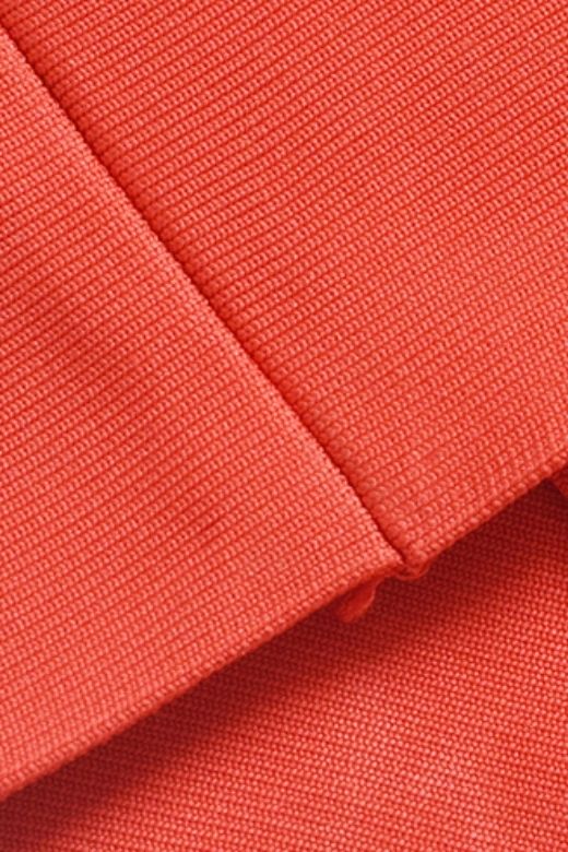Woman wearing a figure flattering Billie Bandage Midi Dress - Lipstick Red Bodycon Collection