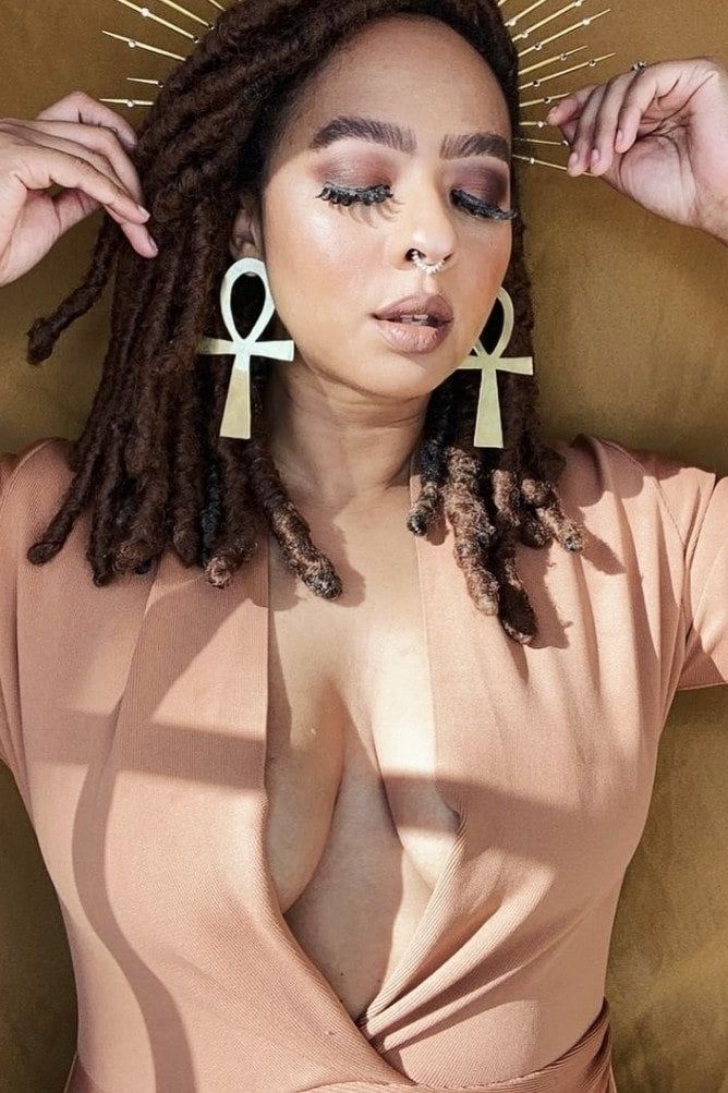 Woman wearing a figure flattering Blaire Long Sleeve Bandage Dress - Tan Brown BODYCON COLLECTION