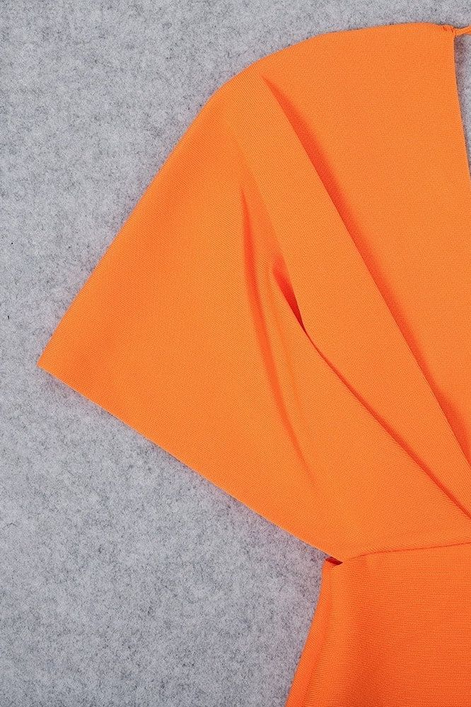 Woman wearing a figure flattering  Blake Bandage Maxi Dress - Apricot Orange BODYCON COLLECTION