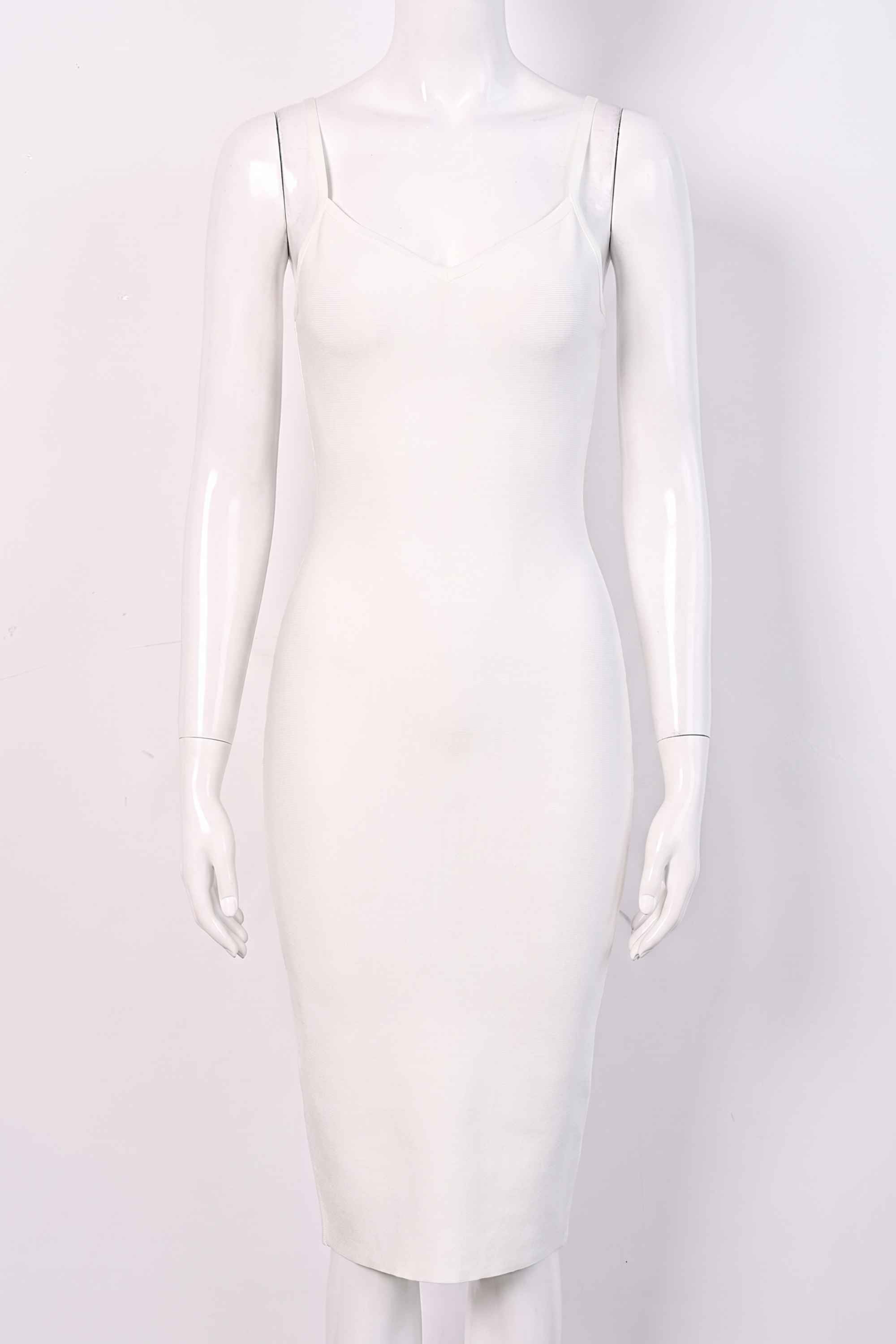 Woman wearing a figure flattering Blanche Bandage Midi Dress - Pearl White BODYCON COLLECTION