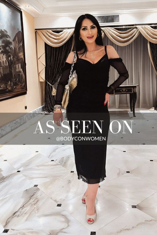 Woman wearing a figure flattering Brianna Bodycon Long Sleeve Maxi Dress - Classic Black BODYCON COLLECTION