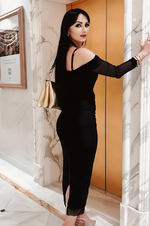 Woman wearing a figure flattering Brianna Bodycon Long Sleeve Maxi Dress - White Pearl BODYCON COLLECTION