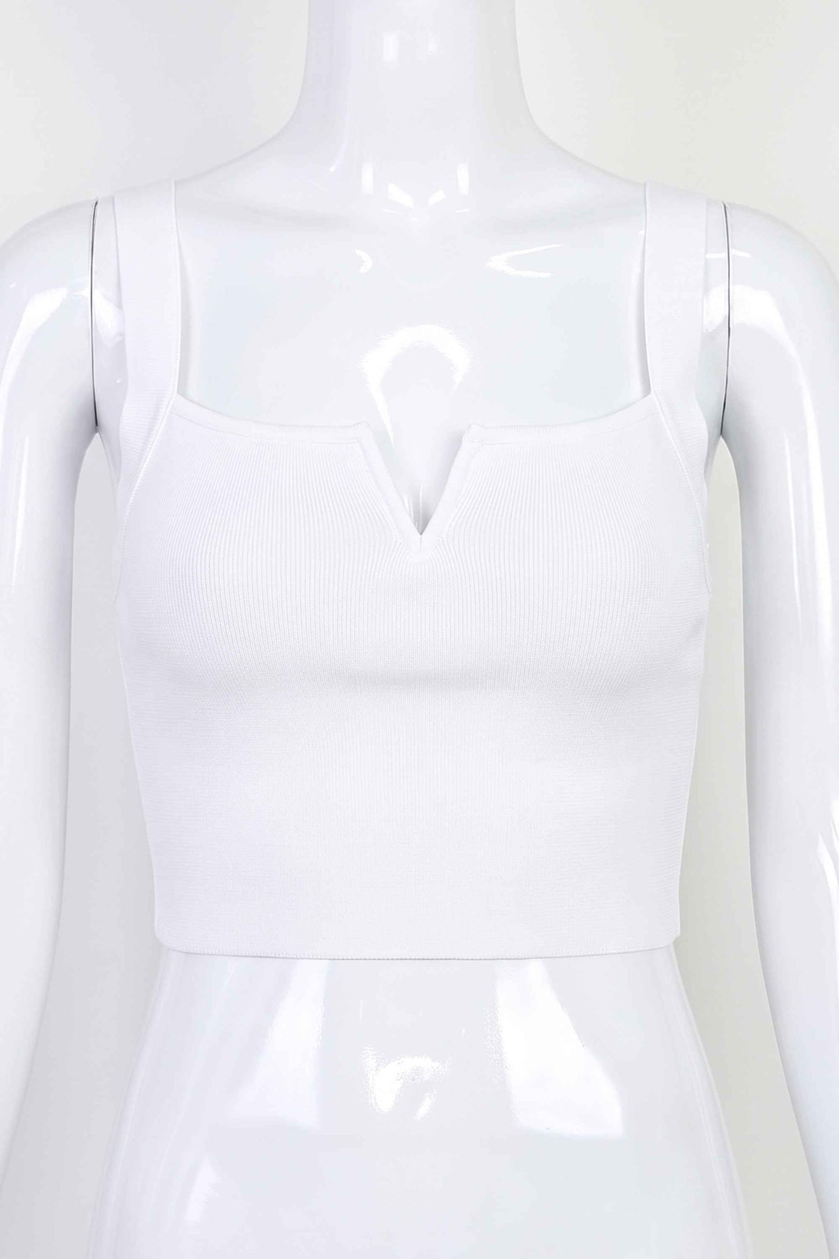 Woman wearing a figure flattering Brooke Bandage Crop Top - Pearl White BODYCON COLLECTION