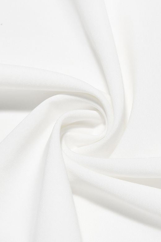 Woman wearing a figure flattering Capri Bodycon Strapless Midi Dress - Pearl White BODYCON COLLECTION