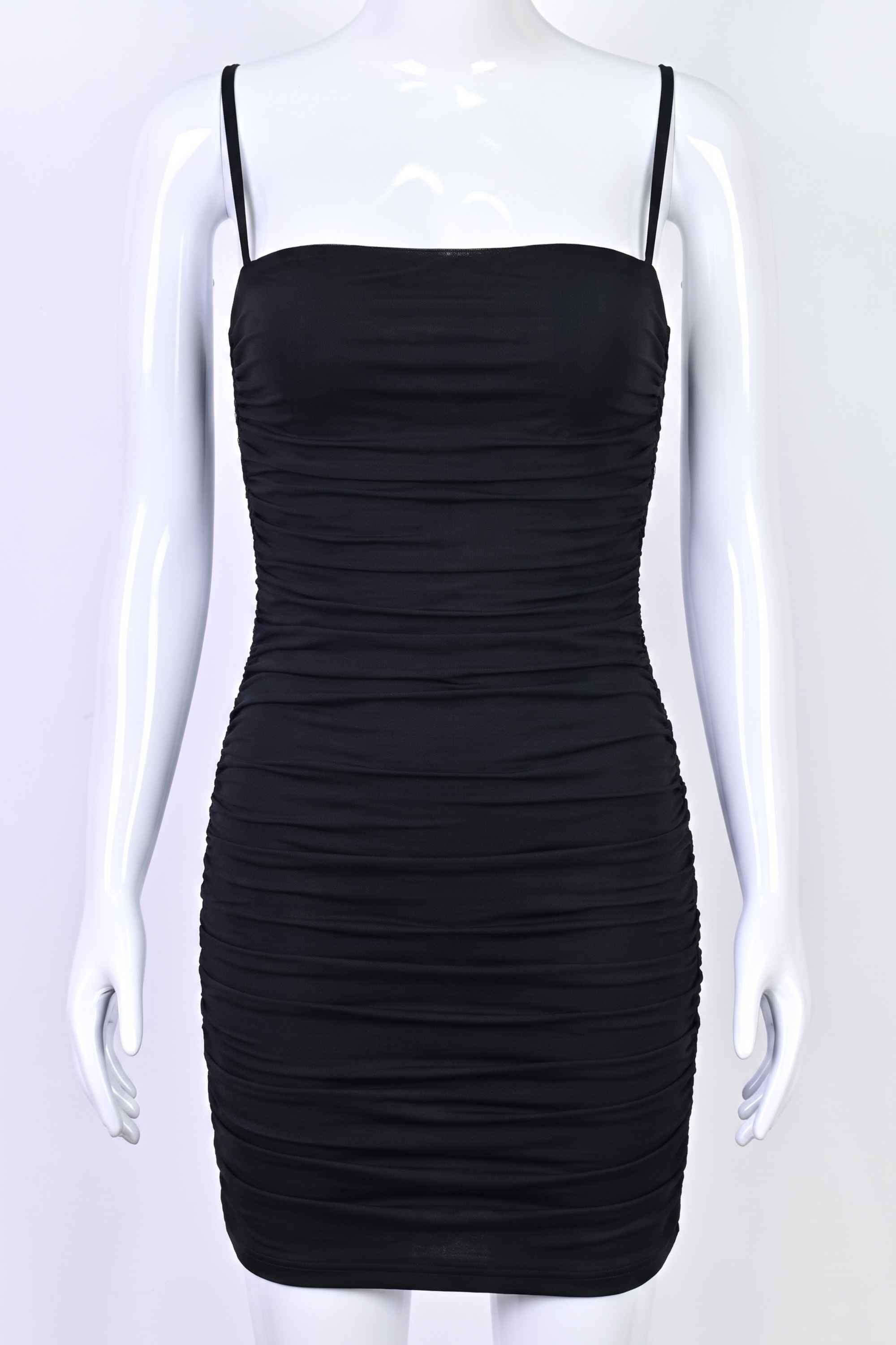 Woman wearing a figure flattering Cassie Bodycon Wrap Mini Dress - Classic Black BODYCON COLLECTION