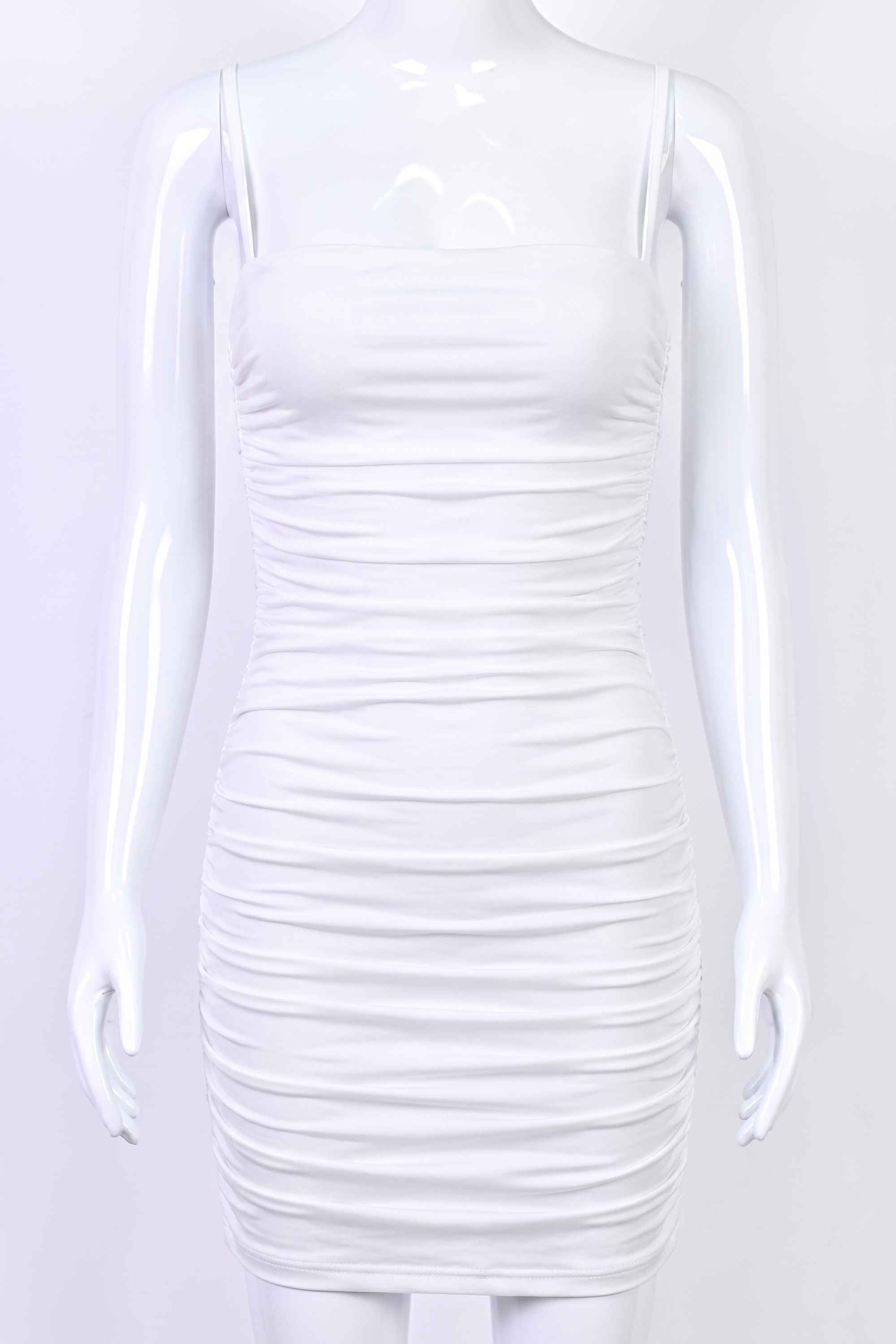 Woman wearing a figure flattering Cassie Bodycon Wrap Mini Dress - Pearl White BODYCON COLLECTION