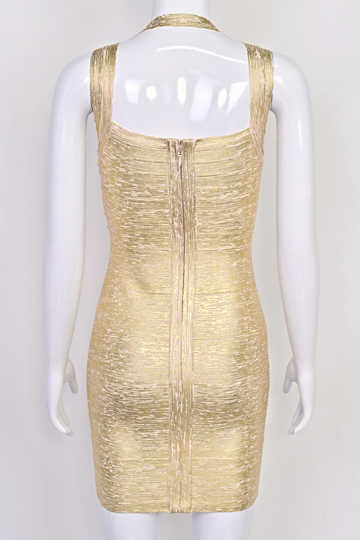 Woman wearing a figure flattering Ciara Bandage Mini Dress - Gold BODYCON COLLECTION