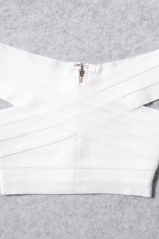 Woman wearing a figure flattering  Cindy Bandage Off Shoulder Crop Top - Pearl White BODYCON COLLECTION