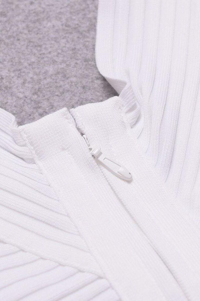 Woman wearing a figure flattering Coco Long Sleeve Bandage Dress - Pearl White BODYCON COLLECTION