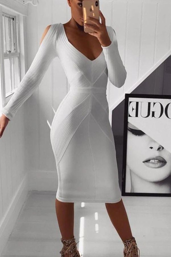 Woman wearing a figure flattering Coco Long Sleeve Bandage Dress - Pearl White BODYCON COLLECTION