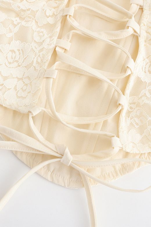Woman wearing a figure flattering Darling Corset Crop Top - Ivory BODYCON COLLECTION