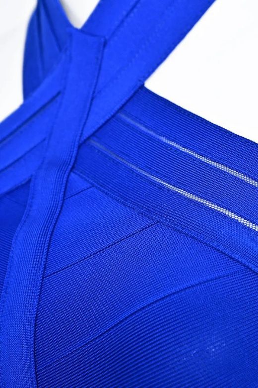 Woman wearing a figure flattering Eden Bandage Dress - Royal Blue BODYCON COLLECTION