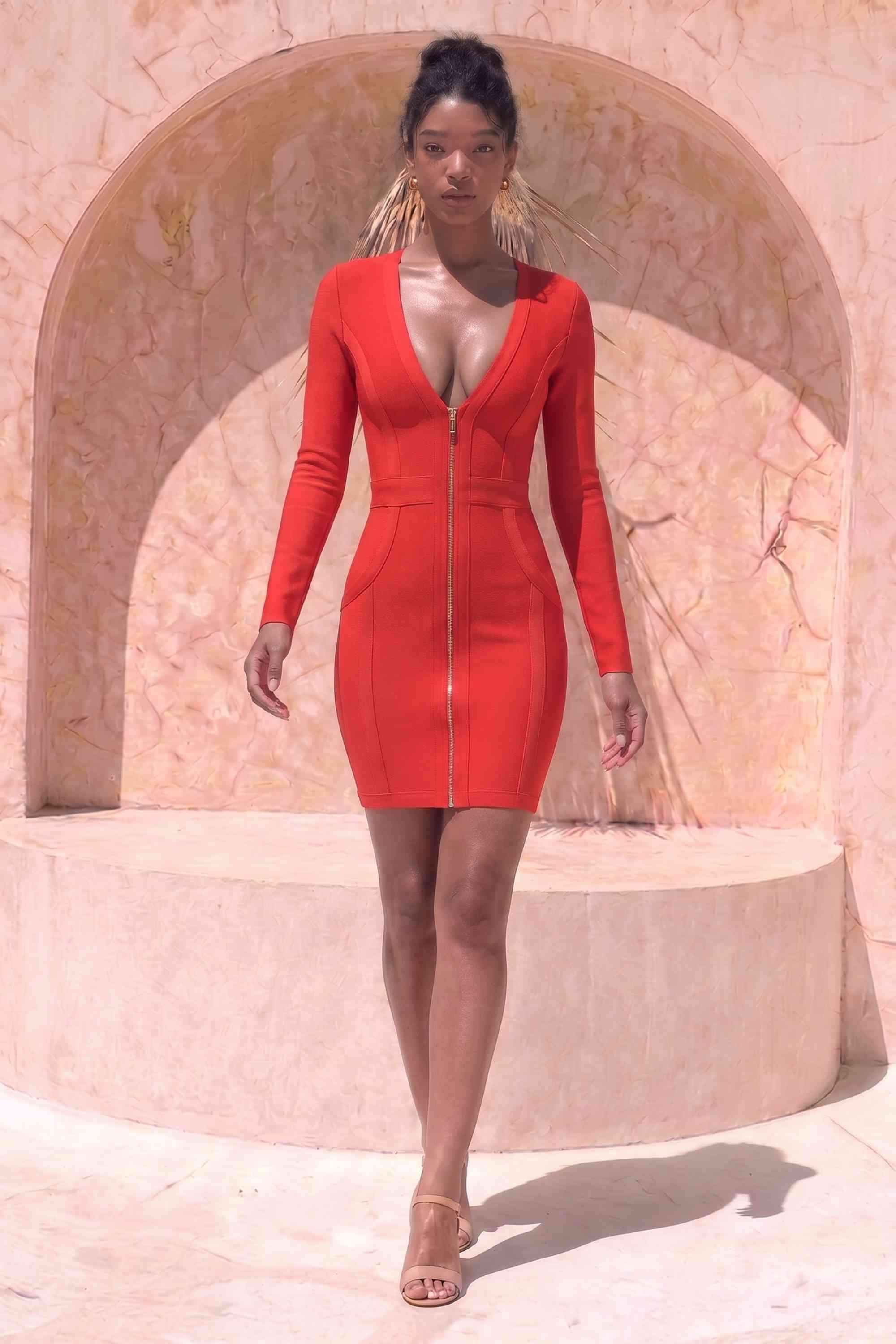 Woman wearing a figure flattering Eva Long Sleeve Bandage Mini Dress - Lipstick Red BODYCON COLLECTION