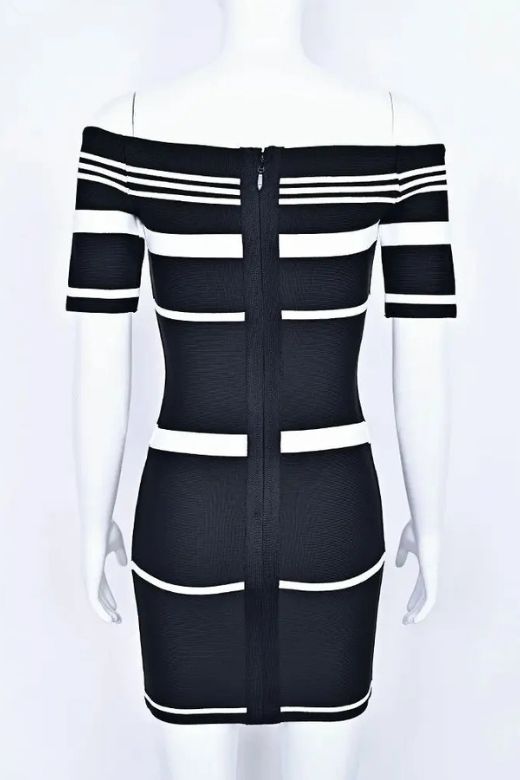Woman wearing a figure flattering Evelyn Bandage Mini Dress - Classic Black BODYCON COLLECTION Pty Ltd