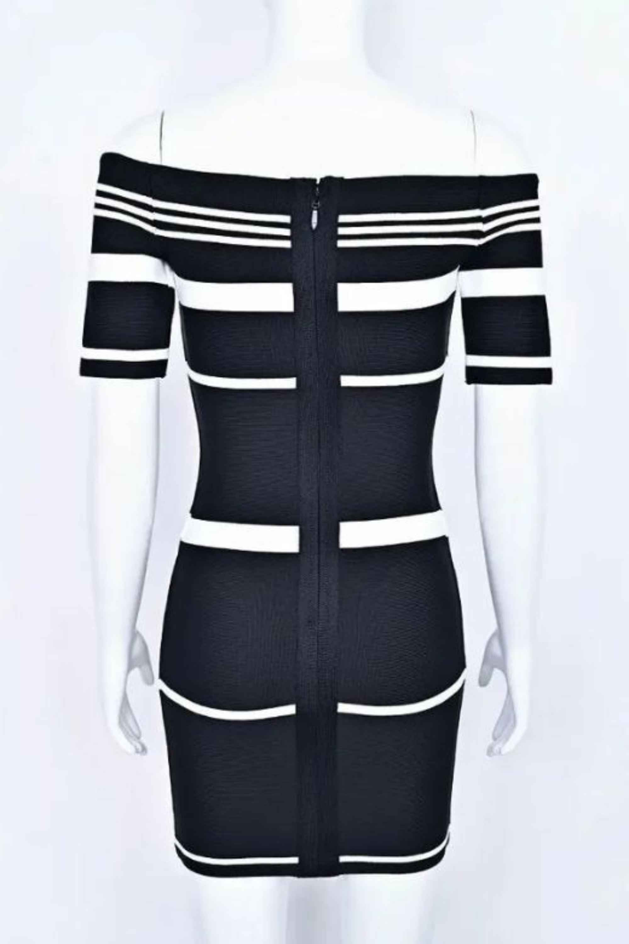 Woman wearing a figure flattering Evelyn Bandage Mini Dress - Classic Black BODYCON COLLECTION Pty Ltd