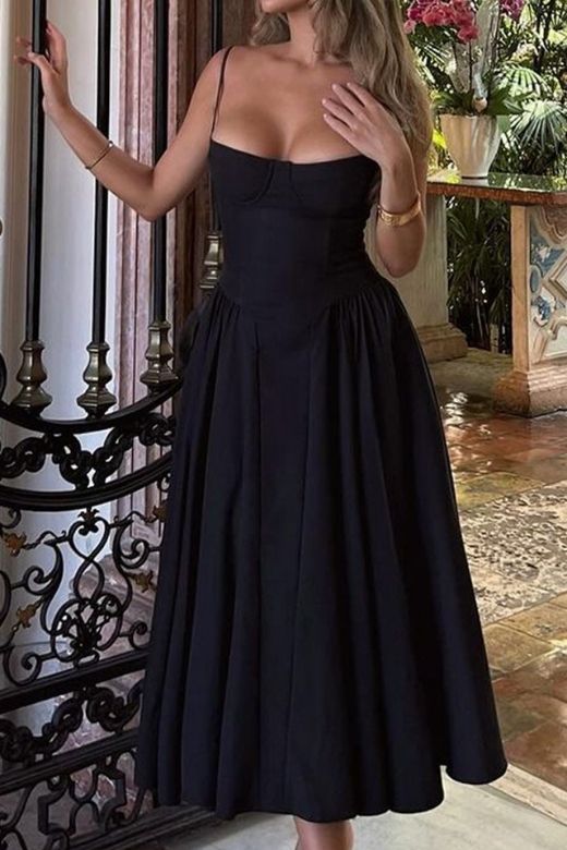 Woman wearing a figure flattering Everly Day Midi Dress - Classic Black BODYCON COLLECTION