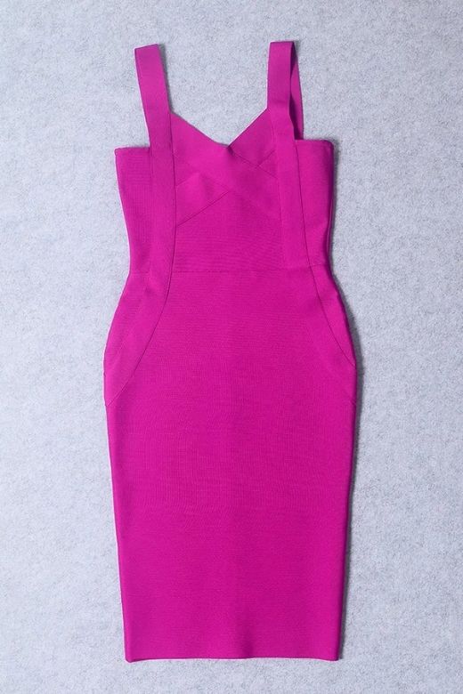 Woman wearing a figure flattering Freya Bandage Dress - Magenta Pink BODYCON COLLECTION
